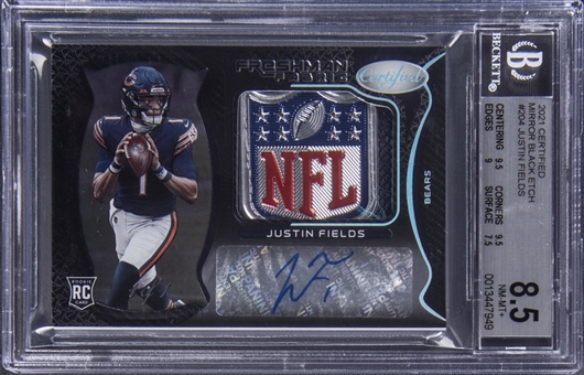 2021 Panini Certified "Freshman Fabric" Mirror Black Etch #204 Justin Fields Signed NFL Shield Logo Patch Rookie Card (#1/1) – BGS NM-MT+ 8.5/BGS 10